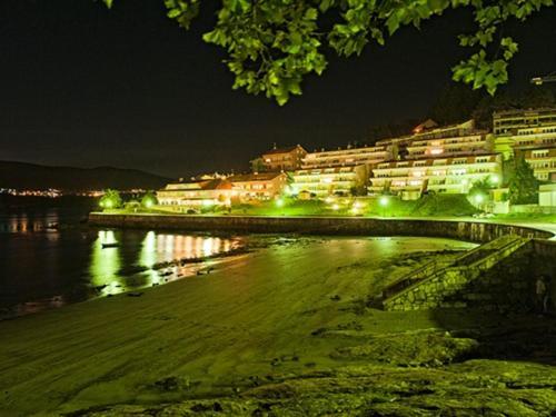 Hotel Corcubion Playa De Quenxe Екстериор снимка