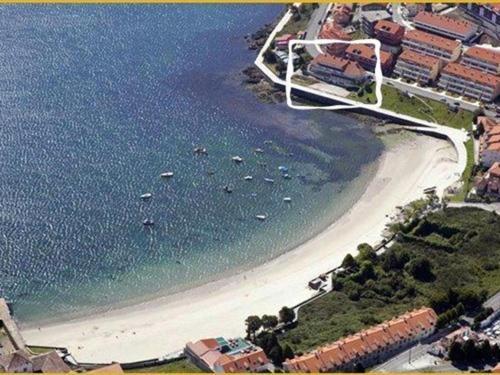 Hotel Corcubion Playa De Quenxe Екстериор снимка