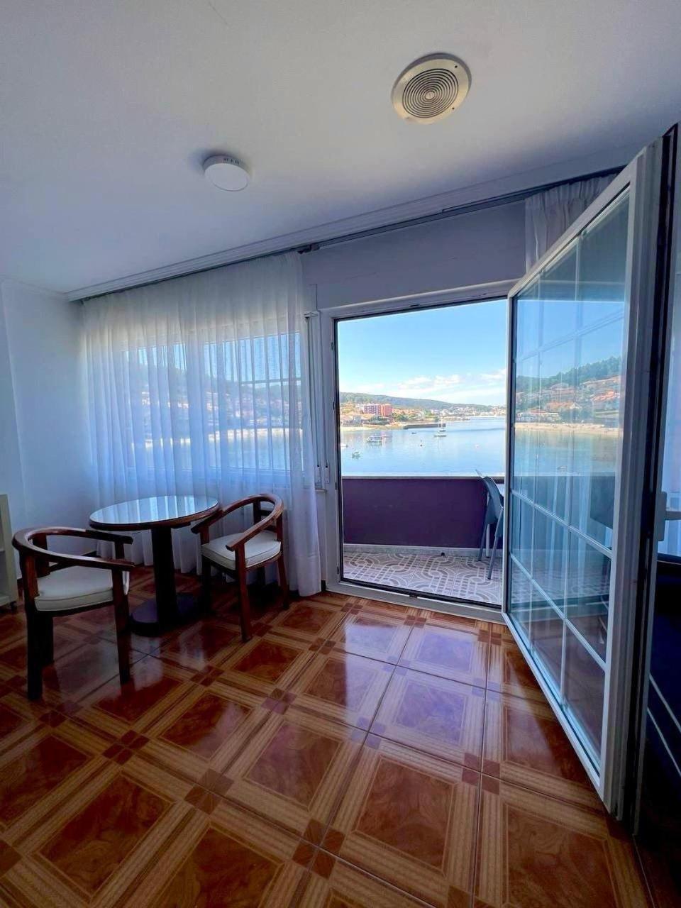 Hotel Corcubion Playa De Quenxe Стая снимка