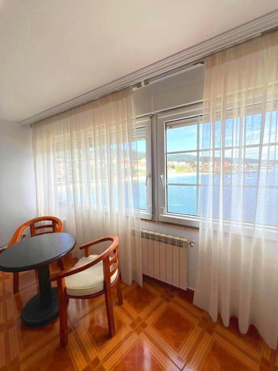 Hotel Corcubion Playa De Quenxe Стая снимка